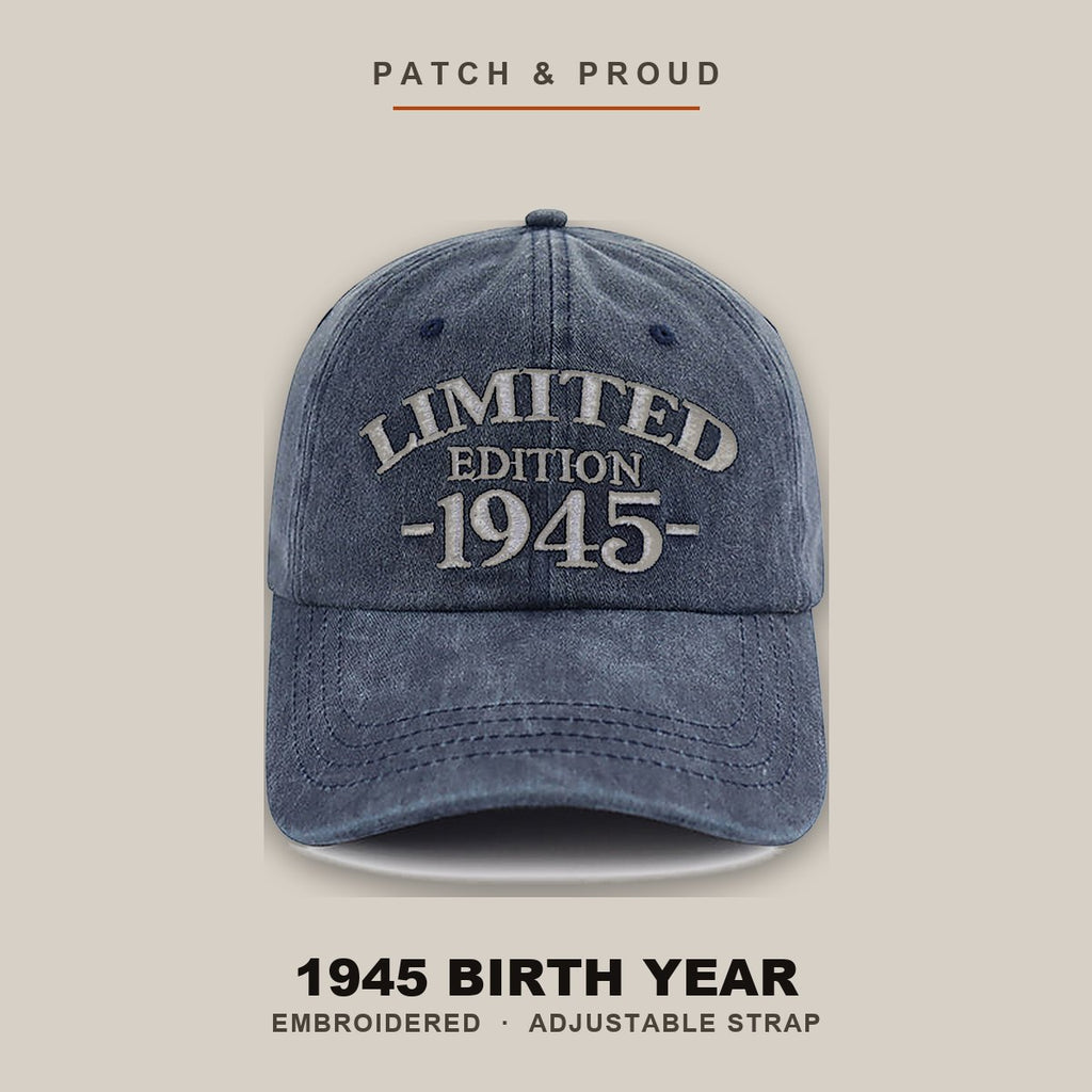 1945 Birth Year Embroidered Cap - Navy - shown on a canvas backdrop