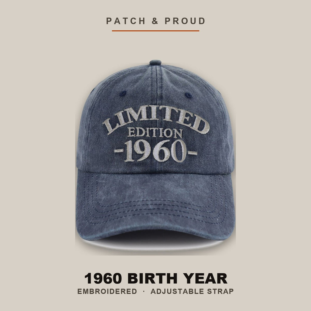 1960 Birth Year Embroidered Cap - Navy - shown on a canvas backdrop