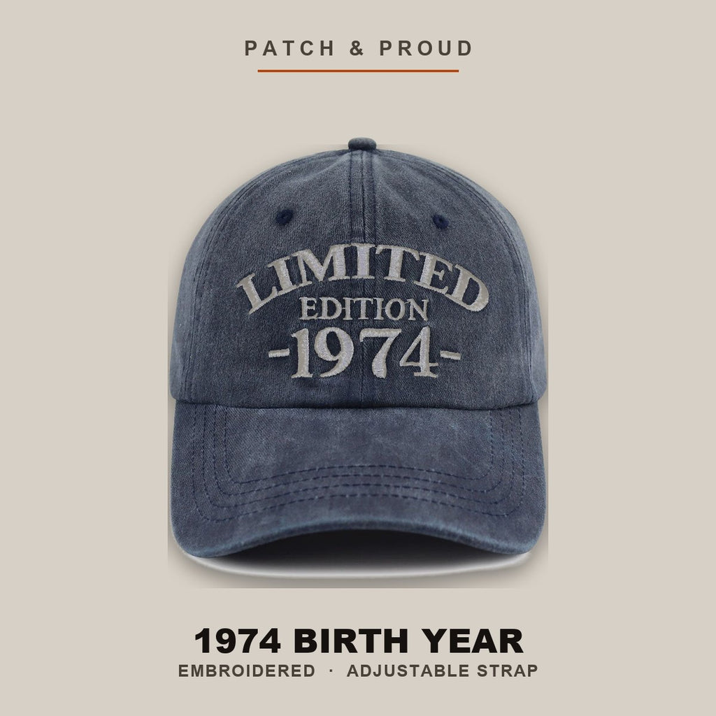 1974 Birth Year Embroidered Cap - Navy - shown on a canvas backdrop