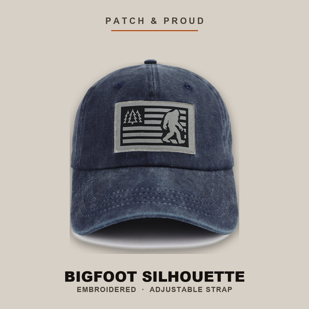 Bigfoot Silhouette Embroidered Cap - Navy - shown on a canvas backdrop