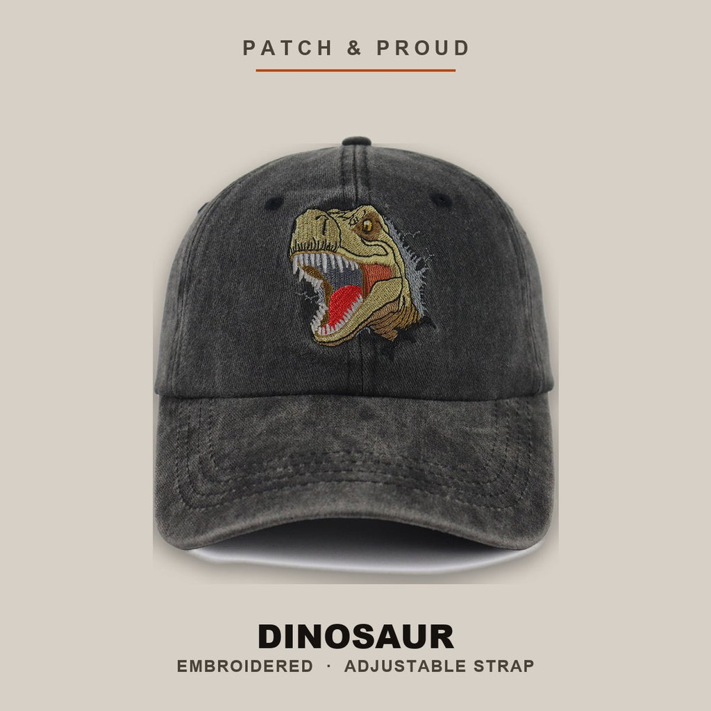 Dinosaur Embroidered Cap - shown on a canvas backdrop