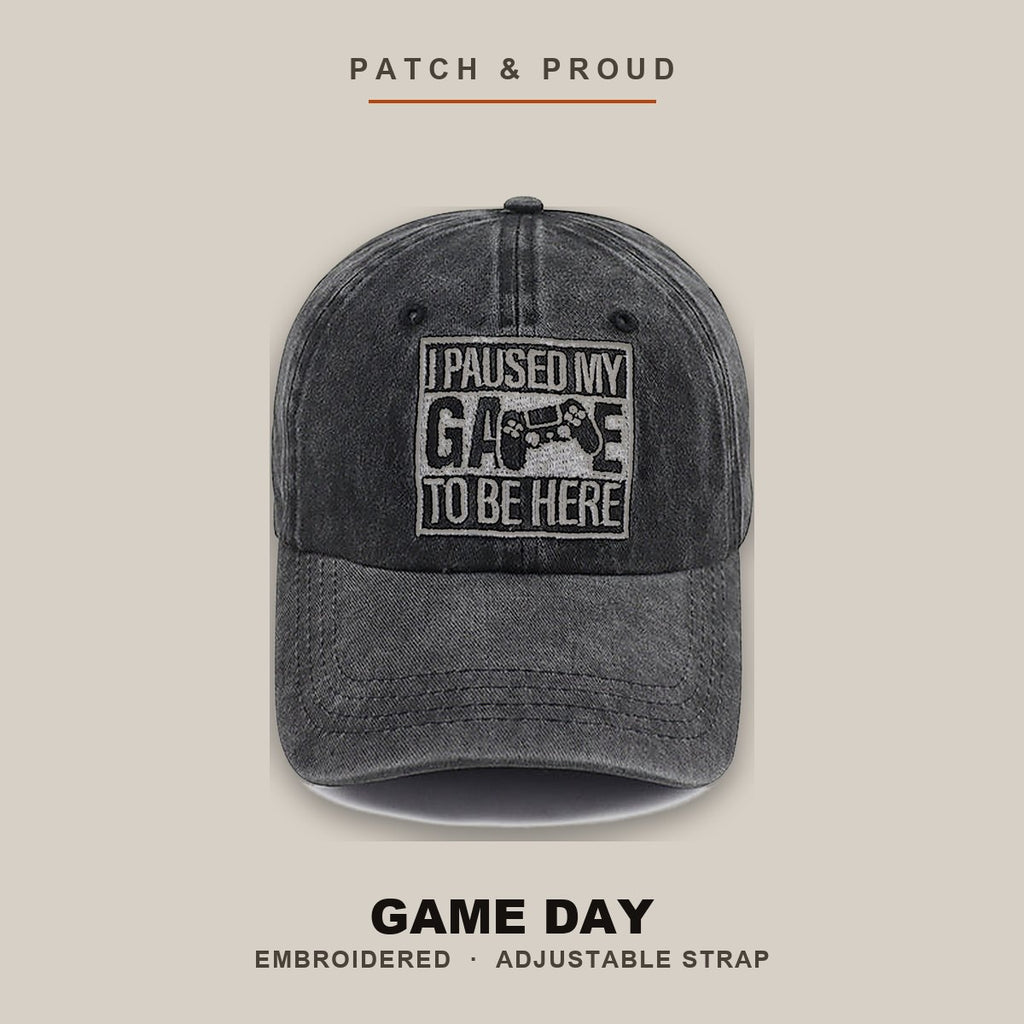 Game Day Embroidered Cap - Black - shown on a canvas backdrop
